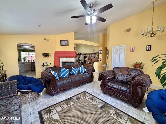 1816 Orange St, Rosamond, CA 93560 - living area featuring a ceiling fan, a chandelier, arched walkways, and lofted ceiling