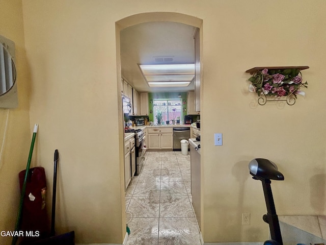 1816 Orange St, Rosamond, CA 93560 - hallway featuring arched walkways