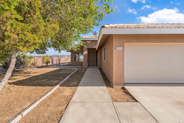 view of property exterior with a garage