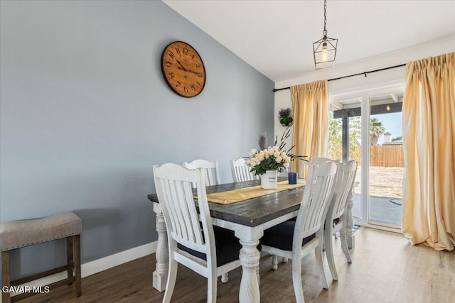 8649 Tamarack Ave, California City, CA 93505 - dining space with wood finished floors and vaulted ceiling