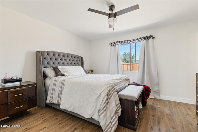 8649 Tamarack Ave, California City, CA 93505 - bedroom featuring wood finished floors and ceiling fan