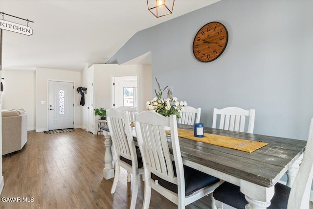 8649 Tamarack Ave, California City, CA 93505 - dining area with wood finished floors and vaulted ceiling