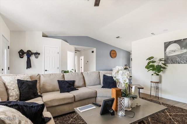 8649 Tamarack Ave, California City, CA 93505 - living room with vaulted ceiling and wood finished floors