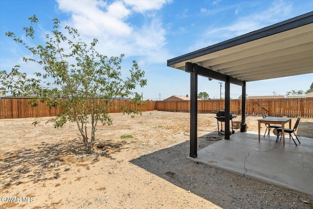 8649 Tamarack Ave, California City, CA 93505 - fenced backyard featuring a patio