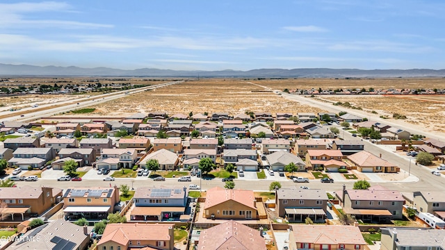 2407 Bavarian Ave, Rosamond, CA 93560 - aerial view of residential area featuring a mountain backdrop