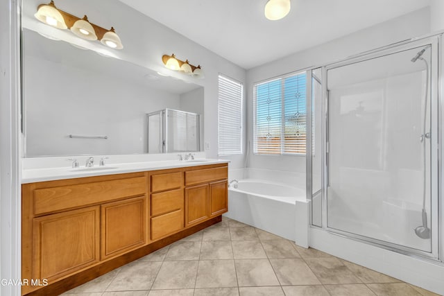 2407 Bavarian Ave, Rosamond, CA 93560 - full bathroom featuring a stall shower, a bath, double vanity, and tile patterned floors