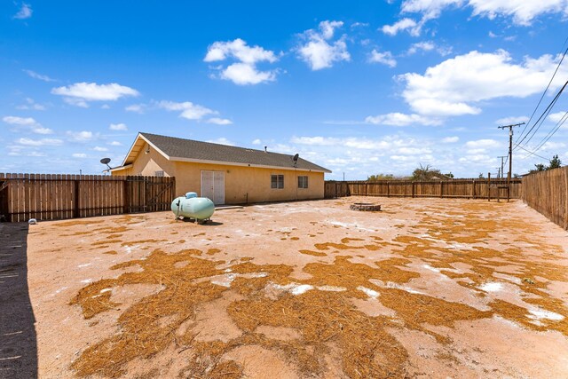 exterior space featuring a fire pit