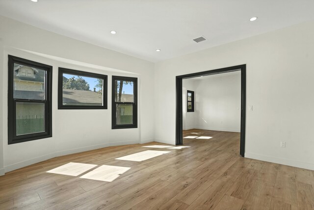 2745 Kenwood Ave, Los Angeles, CA 90007 - spare room featuring light wood finished floors, visible vents, baseboards, and recessed lighting