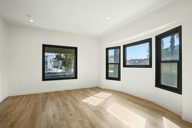 2745 Kenwood Ave, Los Angeles, CA 90007 - empty room with light wood-type flooring, baseboards, and recessed lighting