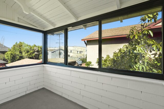 2745 Kenwood Ave, Los Angeles, CA 90007 - unfurnished sunroom with vaulted ceiling with beams