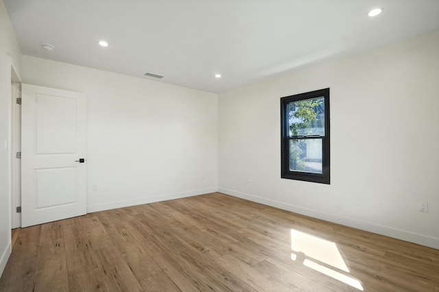 2745 Kenwood Ave, Los Angeles, CA 90007 - unfurnished room with light wood-style flooring, visible vents, baseboards, and recessed lighting