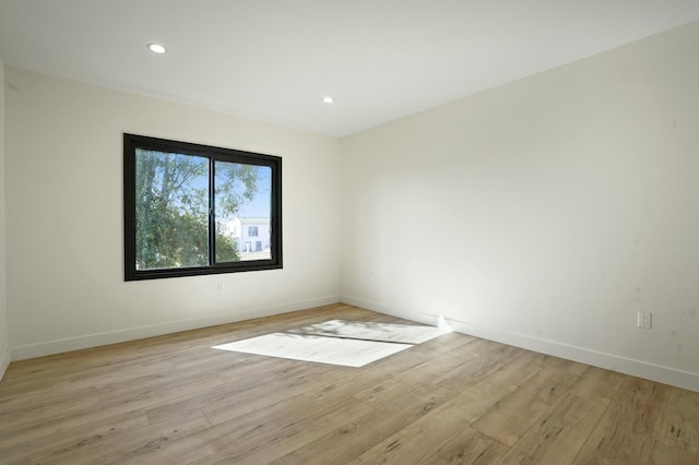 2745 Kenwood Ave, Los Angeles, CA 90007 - unfurnished room featuring light wood-type flooring, baseboards, and recessed lighting