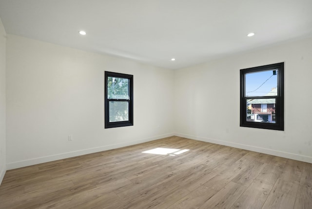 2745 Kenwood Ave, Los Angeles, CA 90007 - spare room featuring light wood-style flooring, baseboards, and recessed lighting
