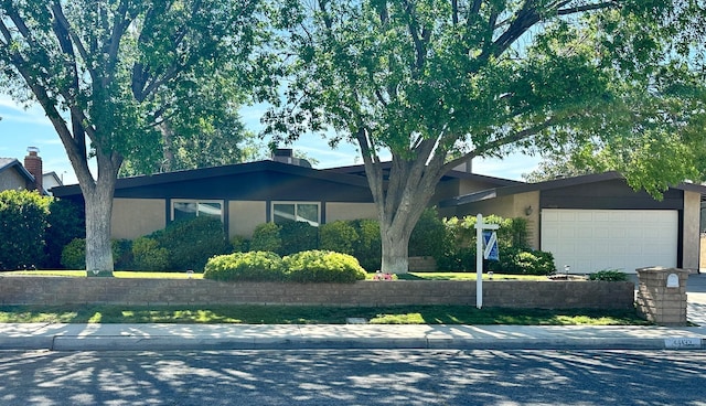 44133 W 28th St, Lancaster, CA 93536 - ranch-style home with a garage and stucco siding