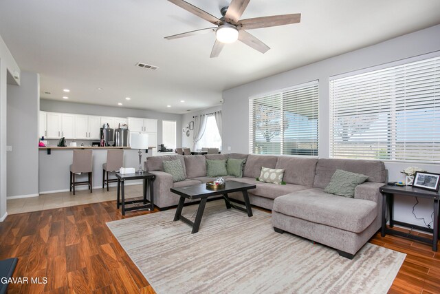 44927 Normandy Ln, Lancaster, CA 93536 - living area featuring ceiling fan, wood finished floors, and recessed lighting