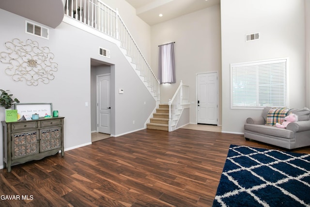 44927 Normandy Ln, Lancaster, CA 93536 - entryway with a towering ceiling, wood finished floors, and stairs