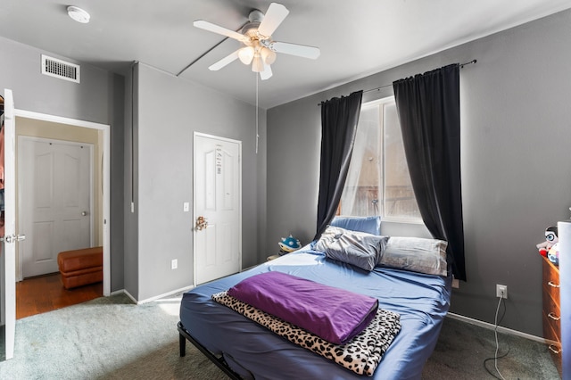 carpeted bedroom with ceiling fan