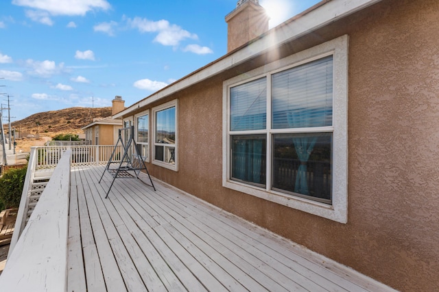 deck with a mountain view