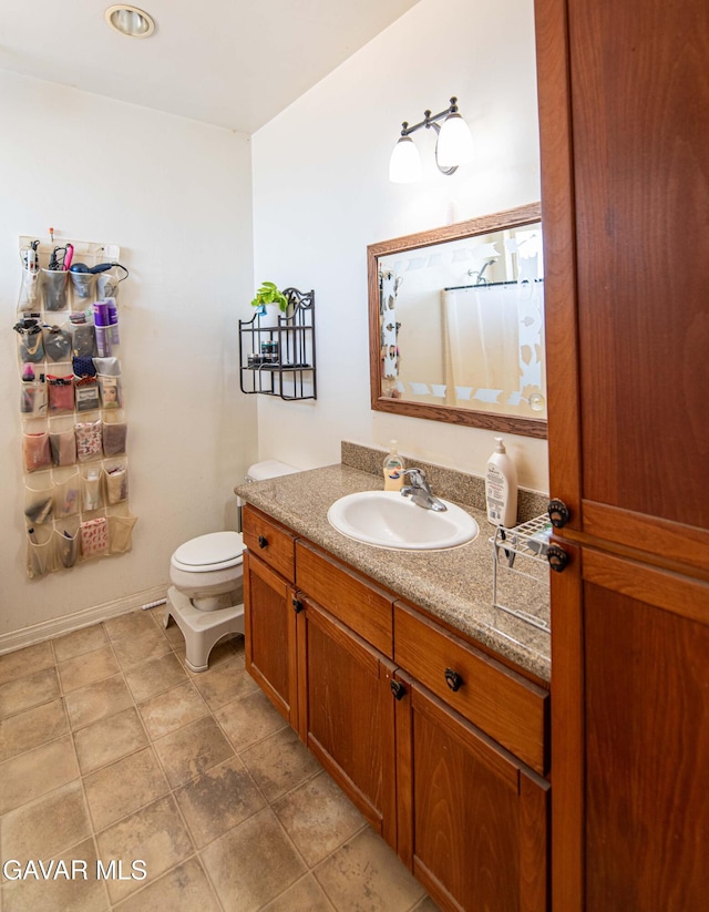 8801 Lupine Loop Dr, California City, CA 93505 - bathroom featuring vanity and toilet
