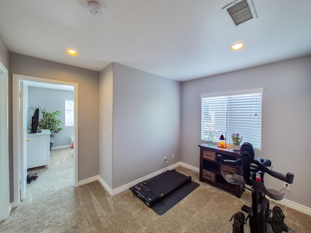 exercise area with light colored carpet, visible vents, baseboards, and recessed lighting