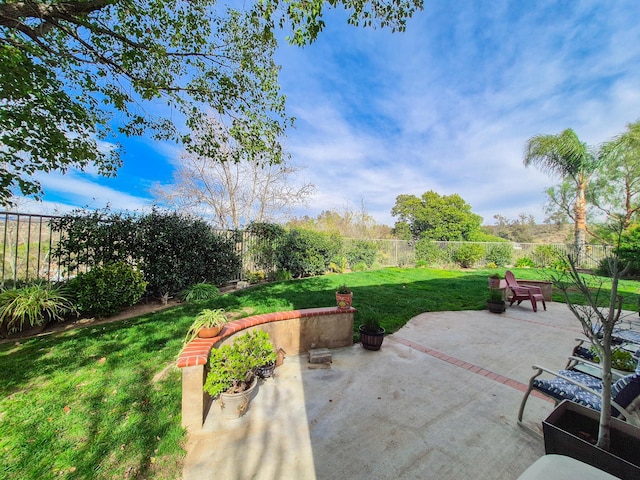 view of patio featuring a fenced backyard