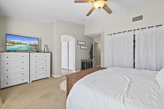 carpeted bedroom featuring ceiling fan