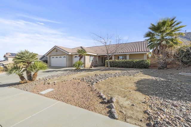 single story home with a garage