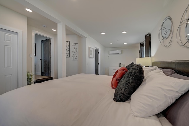 12871 W Osborne St, Arleta, CA 91331 - bedroom with a wall mounted AC and recessed lighting