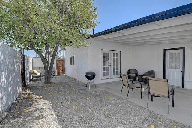 12871 W Osborne St, Arleta, CA 91331 - fenced backyard with french doors, a patio area, and grilling area