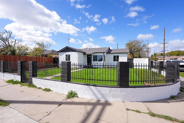 12871 W Osborne St, Arleta, CA 91331 - view of front facade with stucco siding and a fenced front yard