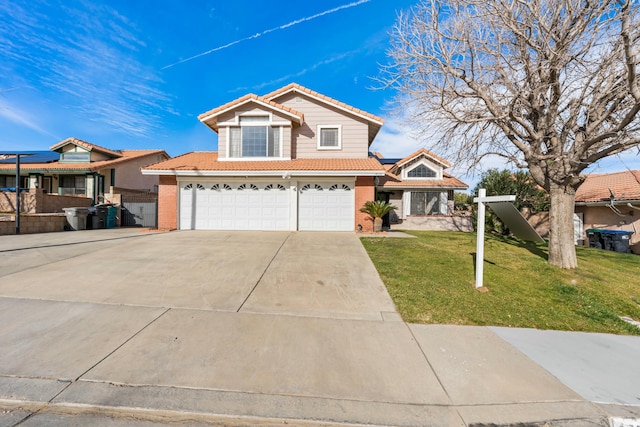 view of front of house with a garage and a front lawn