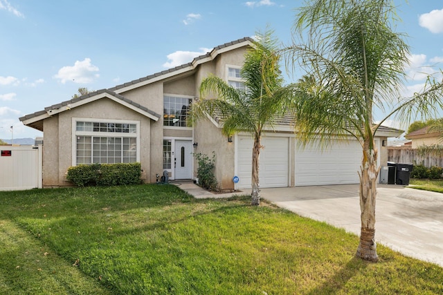 view of front of house with a garage and a front yard