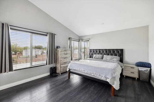 bedroom featuring lofted ceiling and dark wood-type flooring