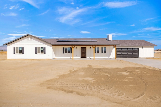 ranch-style home with a garage