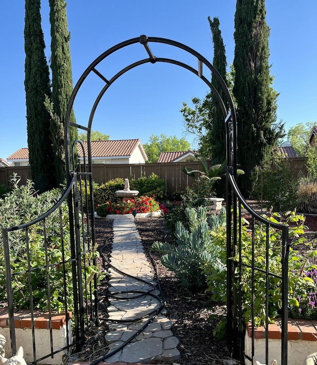 exterior space with a gate and fence