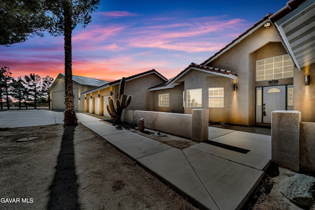 8433 Prospect St, Mojave, CA 93501 - view of front facade with stucco siding