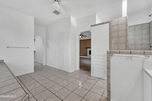 8433 Prospect St, Mojave, CA 93501 - bathroom with ceiling fan, tile patterned floors, and vanity