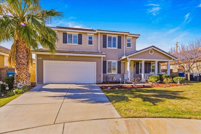 view of front facade featuring a garage, a front yard, and a porch