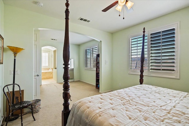 bedroom with light colored carpet and ceiling fan