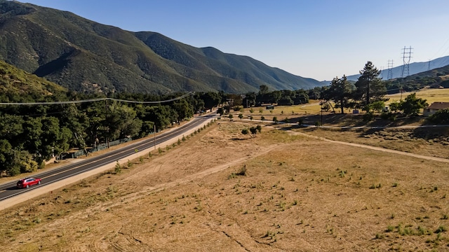 property view of mountains featuring a rural view