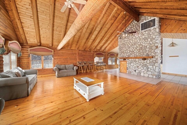 unfurnished living room featuring beamed ceiling, rustic walls, and wooden ceiling