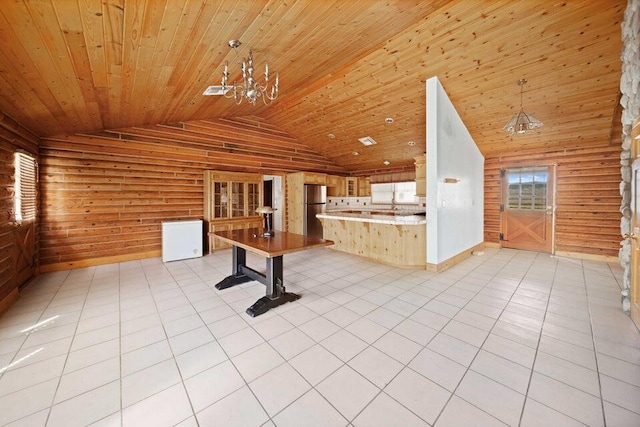 playroom featuring wood ceiling, log walls, light tile patterned floors, an inviting chandelier, and high vaulted ceiling