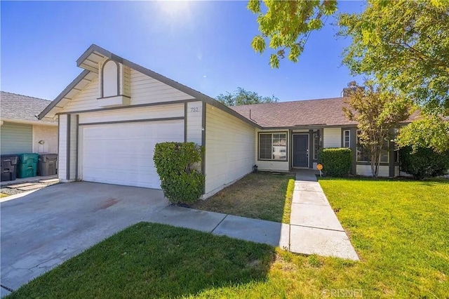 ranch-style house with a front lawn and a garage