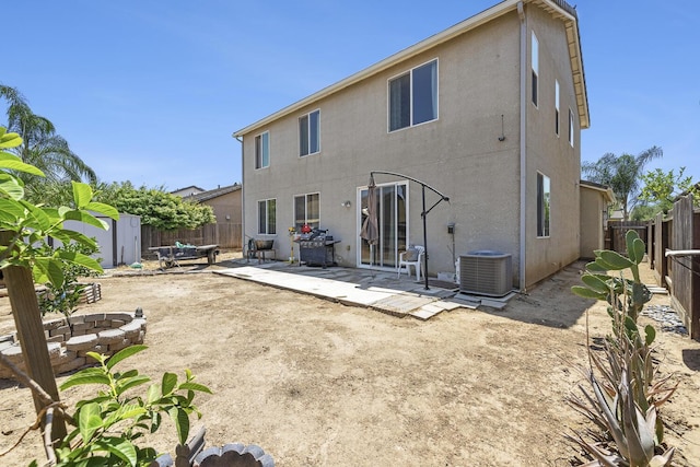 1413 La Quinta Way, Madera, CA 93638 - rear view of property with stucco siding, a patio area, a fenced backyard, and a shed