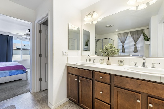 1413 La Quinta Way, Madera, CA 93638 - bathroom with double vanity, a stall shower, and ensuite bath