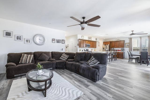 1413 La Quinta Way, Madera, CA 93638 - living area with ceiling fan and light wood finished floors