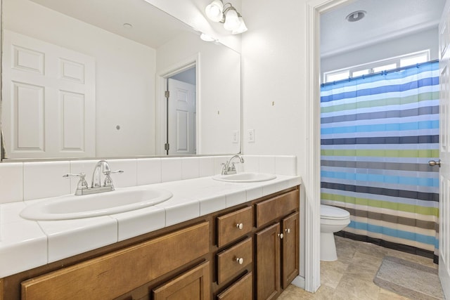 1413 La Quinta Way, Madera, CA 93638 - bathroom featuring double vanity and a shower with shower curtain