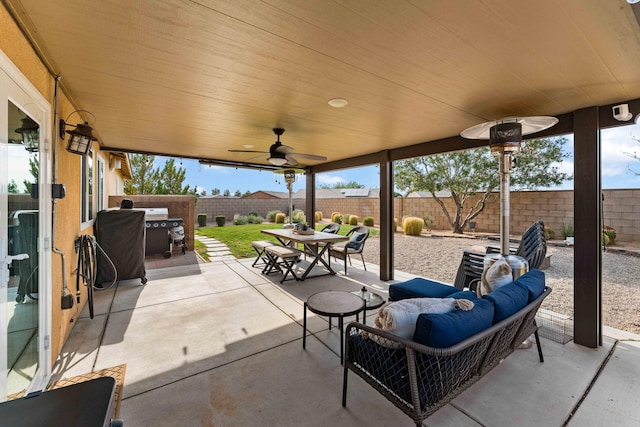 view of patio with a grill and ceiling fan