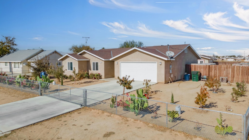 ranch-style house featuring a garage