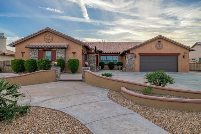 view of front of home with a garage